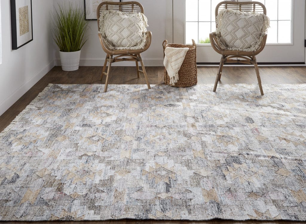 4' X 6' Taupe Gray And Blue Geometric Hand Woven Stain Resistant Area Rug With Fringe