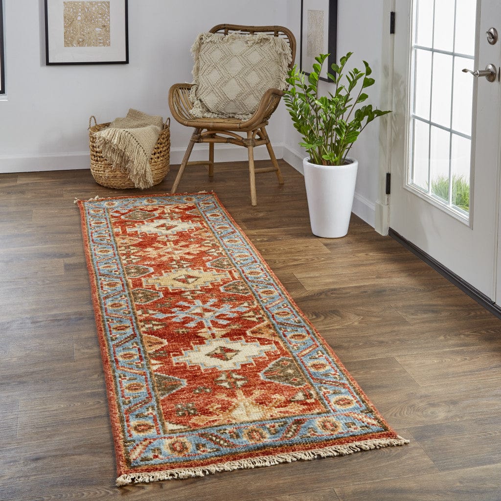 4' X 6' Red Blue And Orange Wool Floral Hand Knotted Stain Resistant Area Rug With Fringe