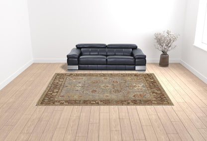 5' X 8' Gray Brown And Gold Wool Floral Hand Knotted Stain Resistant Area Rug With Fringe