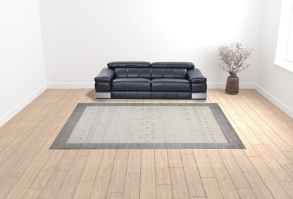 4' X 6' Ivory And Gray Wool Hand Knotted Stain Resistant Area Rug