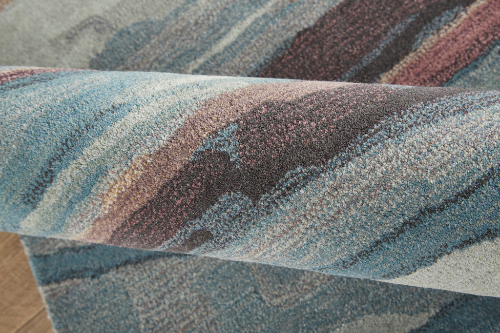 4' X 6' Blue Red And Ivory Wool Abstract Tufted Handmade Stain Resistant Area Rug