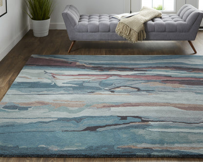 4' X 6' Blue Red And Ivory Wool Abstract Tufted Handmade Stain Resistant Area Rug