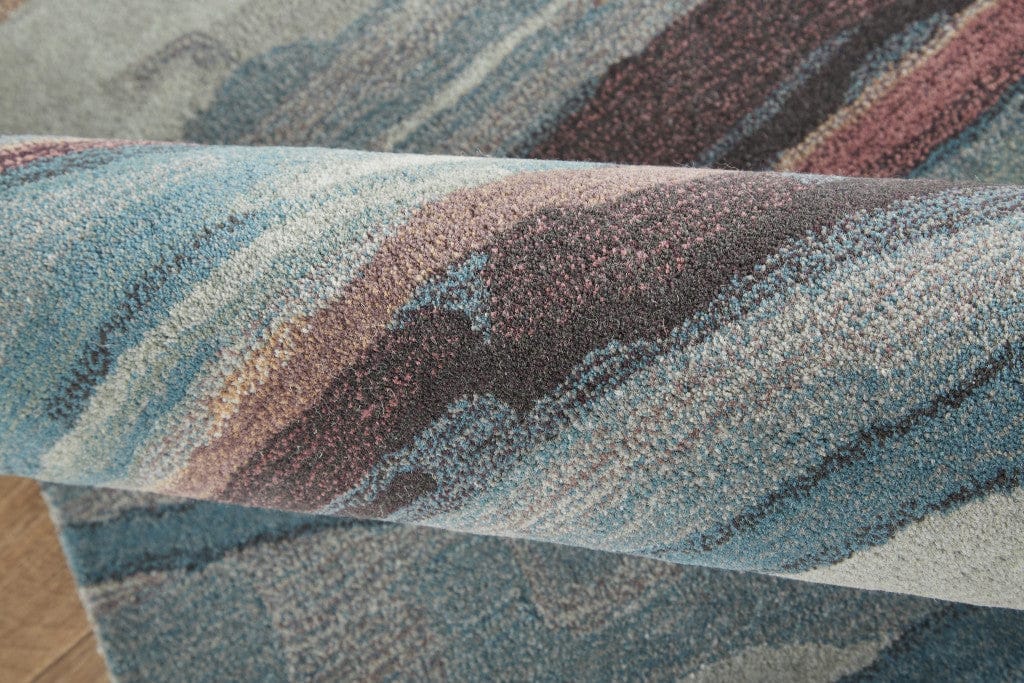 4' X 6' Blue Red And Ivory Wool Abstract Tufted Handmade Stain Resistant Area Rug