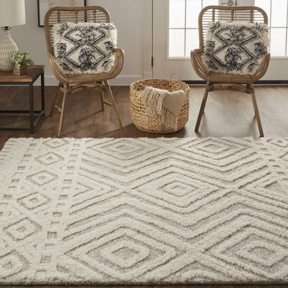 4' X 6' Ivory And Tan Wool Geometric Tufted Handmade Stain Resistant Area Rug