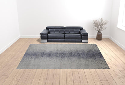 4' X 6' Ivory And Blue Abstract Power Loom Area Rug