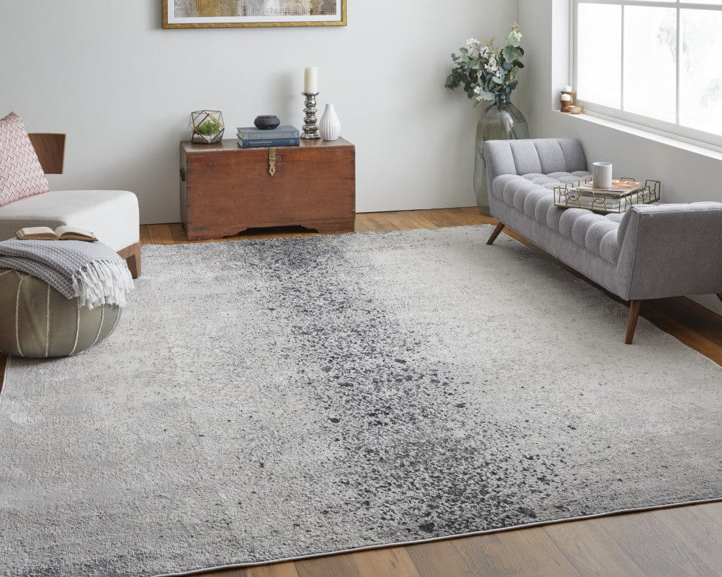 4' X 6' Ivory And Blue Abstract Power Loom Area Rug