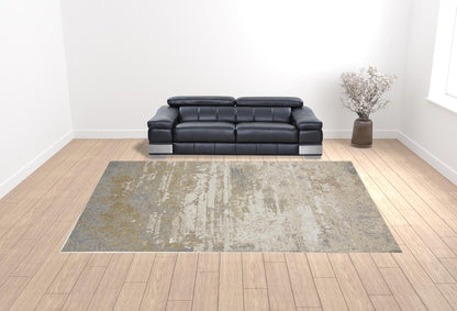 5' X 8' Ivory Gold And Gray Abstract Stain Resistant Area Rug