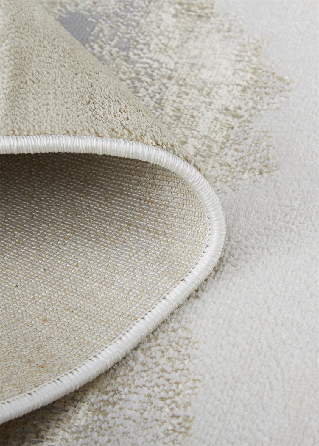 4' X 6' Ivory Tan And Gray Abstract Area Rug