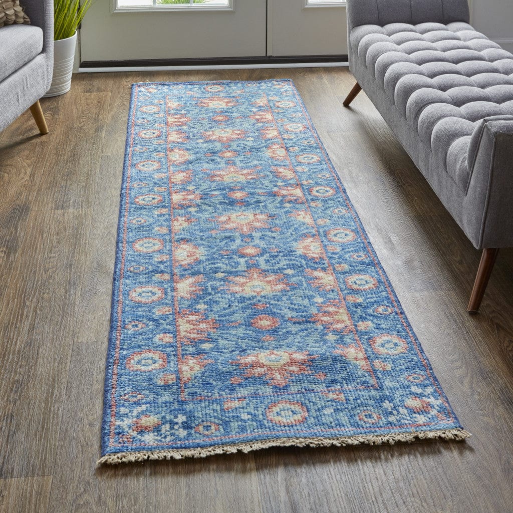 4' X 6' Blue And Red Wool Floral Hand Knotted Stain Resistant Area Rug