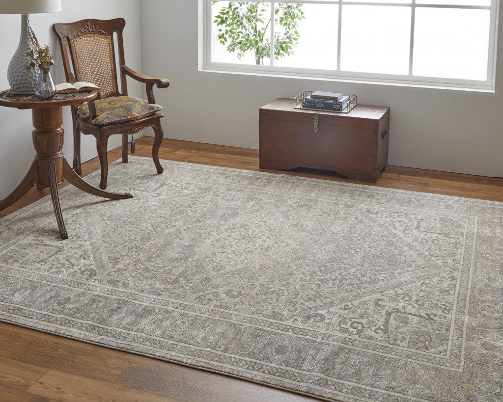 4' X 6' Brown Ivory And Tan Floral Power Loom Distressed Area Rug