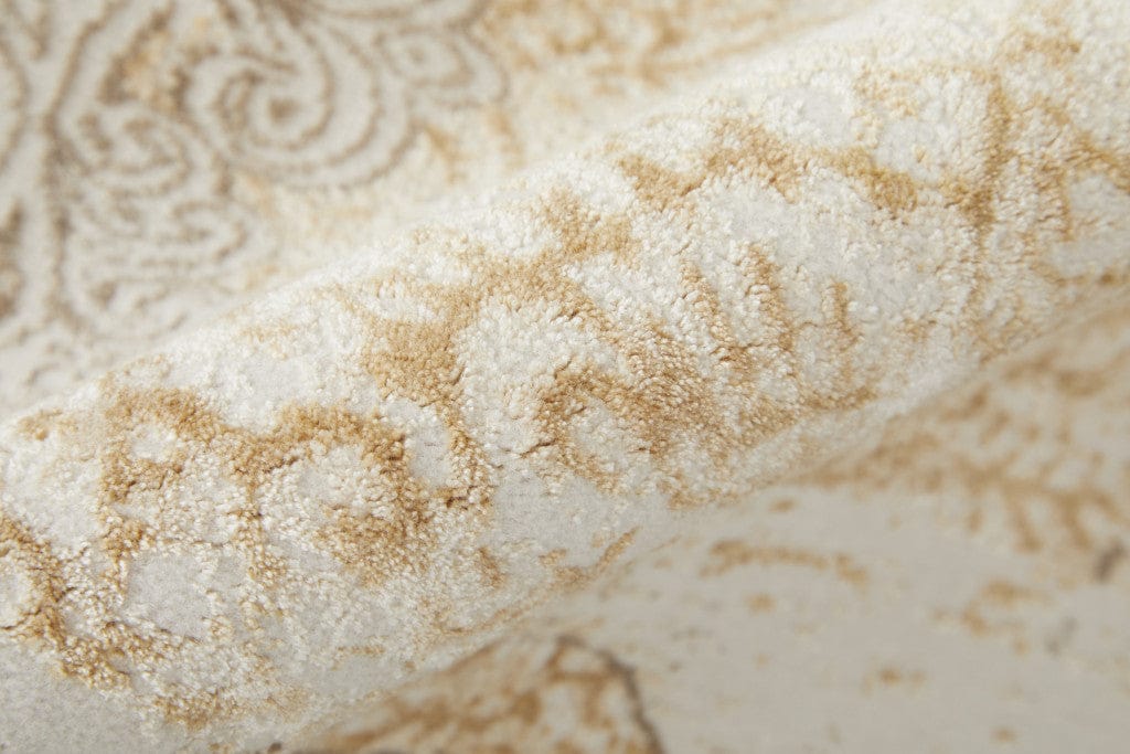 4' X 6' Silver Tan And Gray Floral Power Loom Area Rug