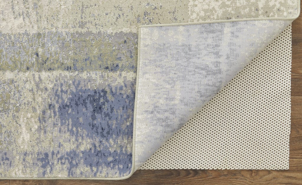 4' X 6' Blue Green And Ivory Abstract Power Loom Distressed Area Rug