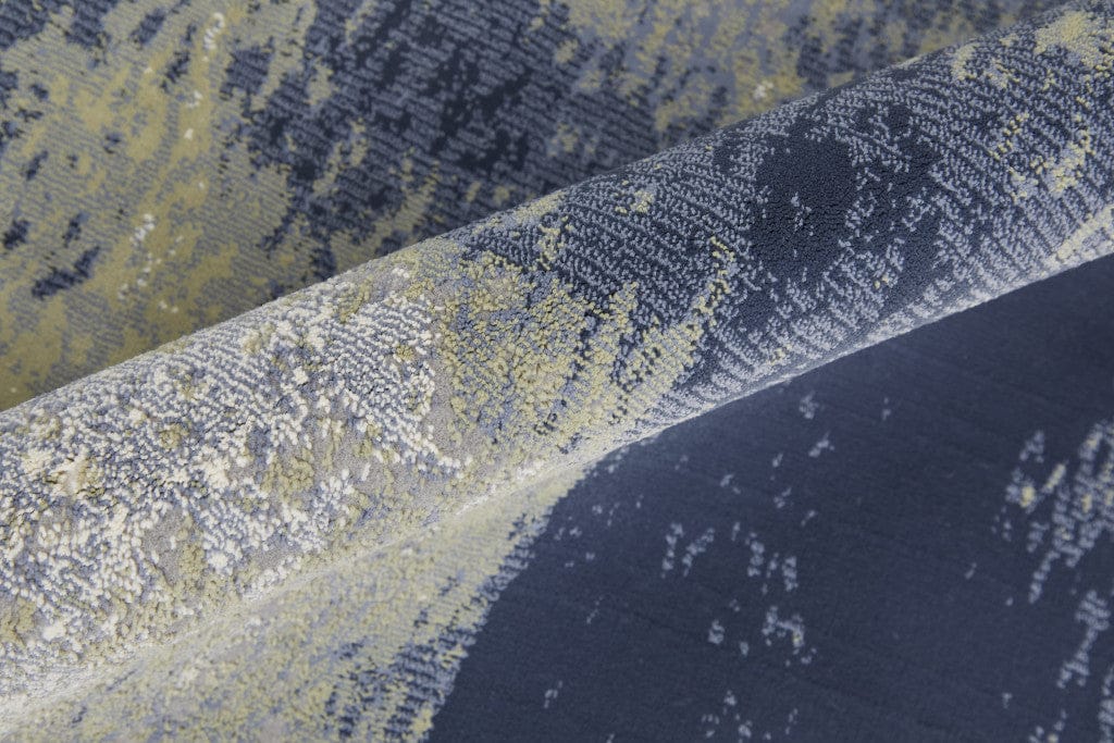 4' X 6' Blue Green And Ivory Abstract Power Loom Distressed Area Rug