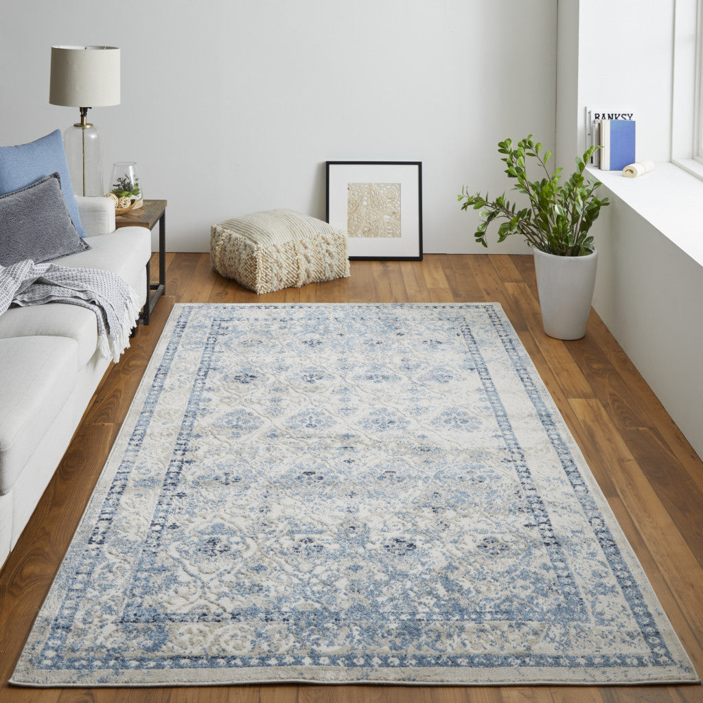 4' X 6' Blue And Ivory Geometric Power Loom Distressed Area Rug