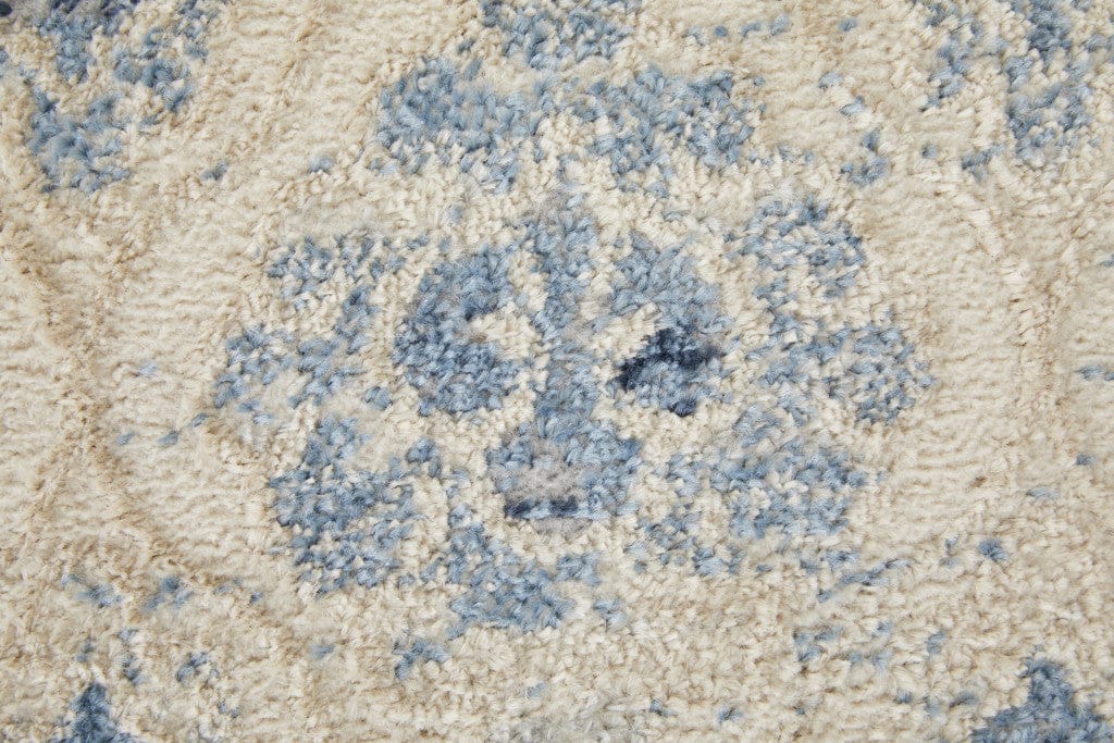 4' X 6' Blue And Ivory Geometric Power Loom Distressed Area Rug