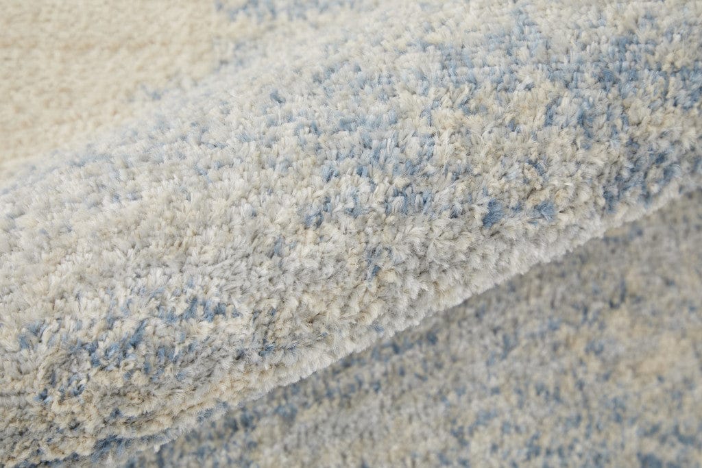 4' X 6' Blue And Ivory Geometric Power Loom Distressed Area Rug