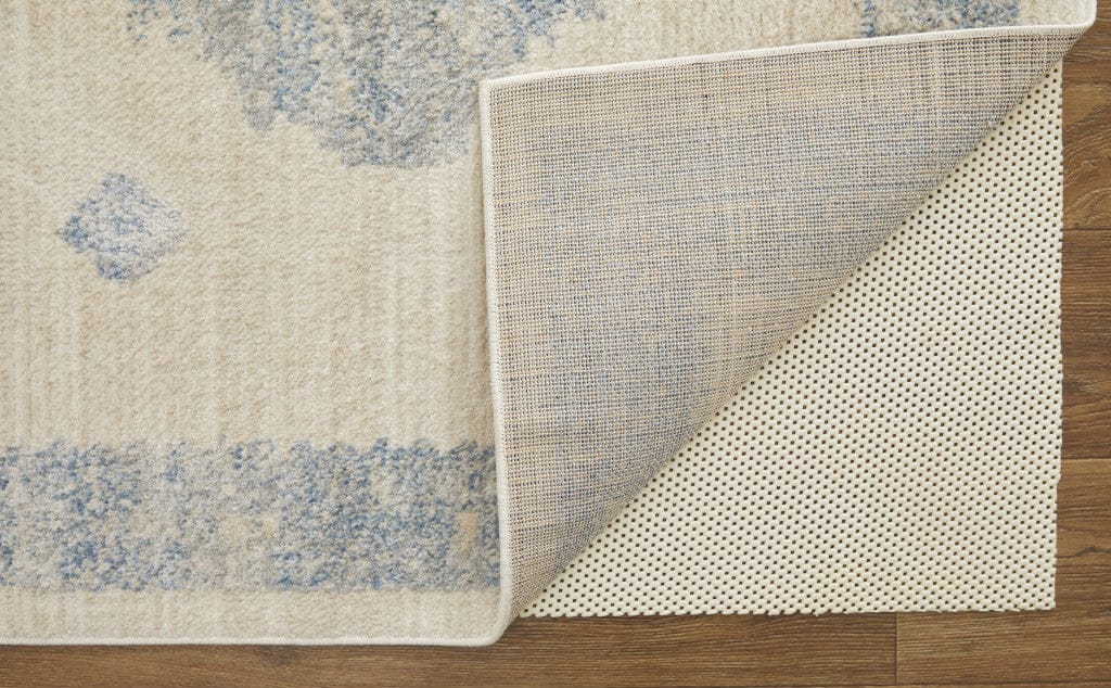 4' X 6' Blue And Ivory Geometric Power Loom Distressed Area Rug