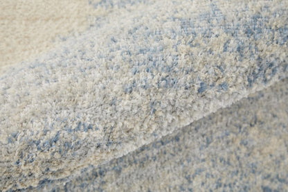 4' X 6' Blue And Ivory Geometric Power Loom Distressed Area Rug