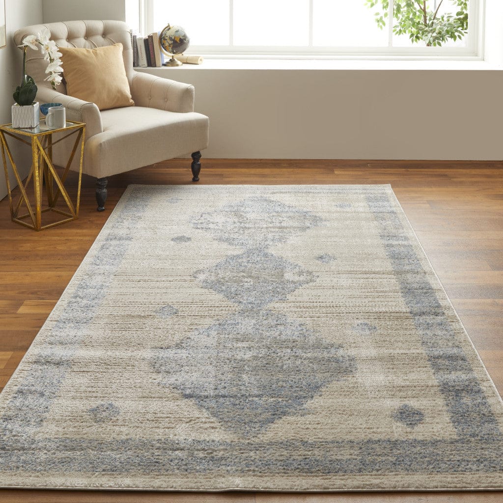 4' X 6' Blue And Ivory Geometric Power Loom Distressed Area Rug