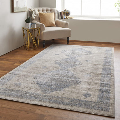 4' X 6' Blue And Ivory Geometric Power Loom Distressed Area Rug