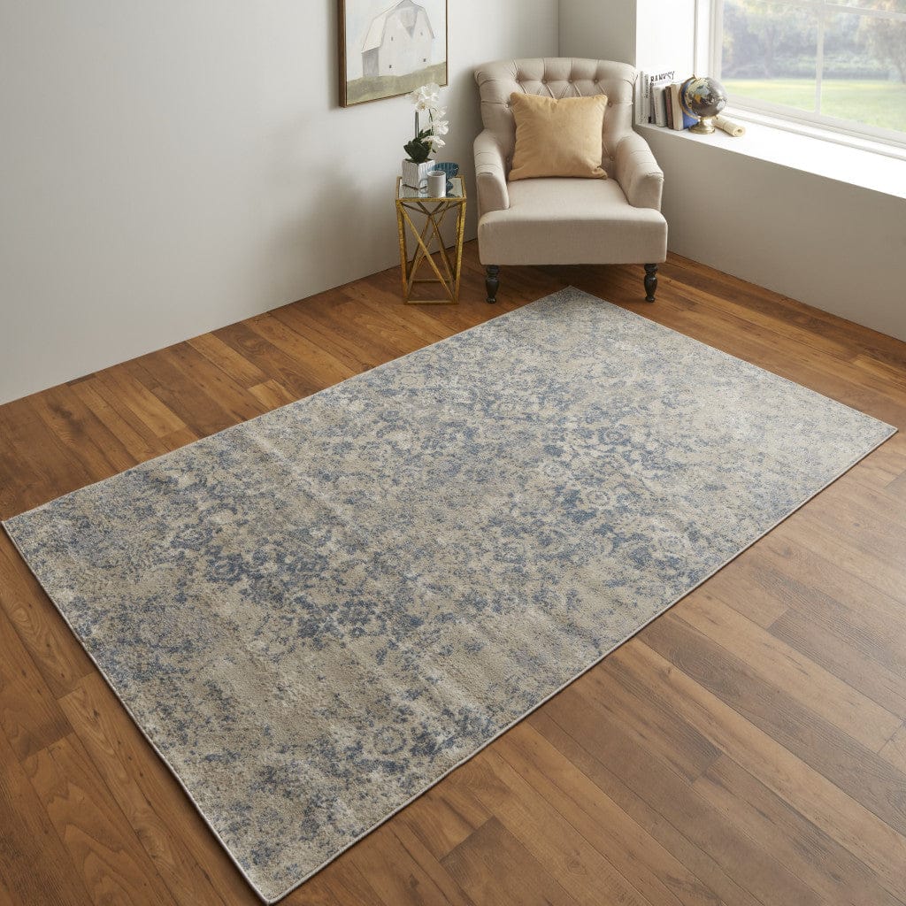 4' X 6' Blue And Ivory Abstract Power Loom Distressed Area Rug