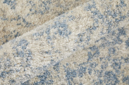4' X 6' Blue And Ivory Abstract Power Loom Distressed Area Rug