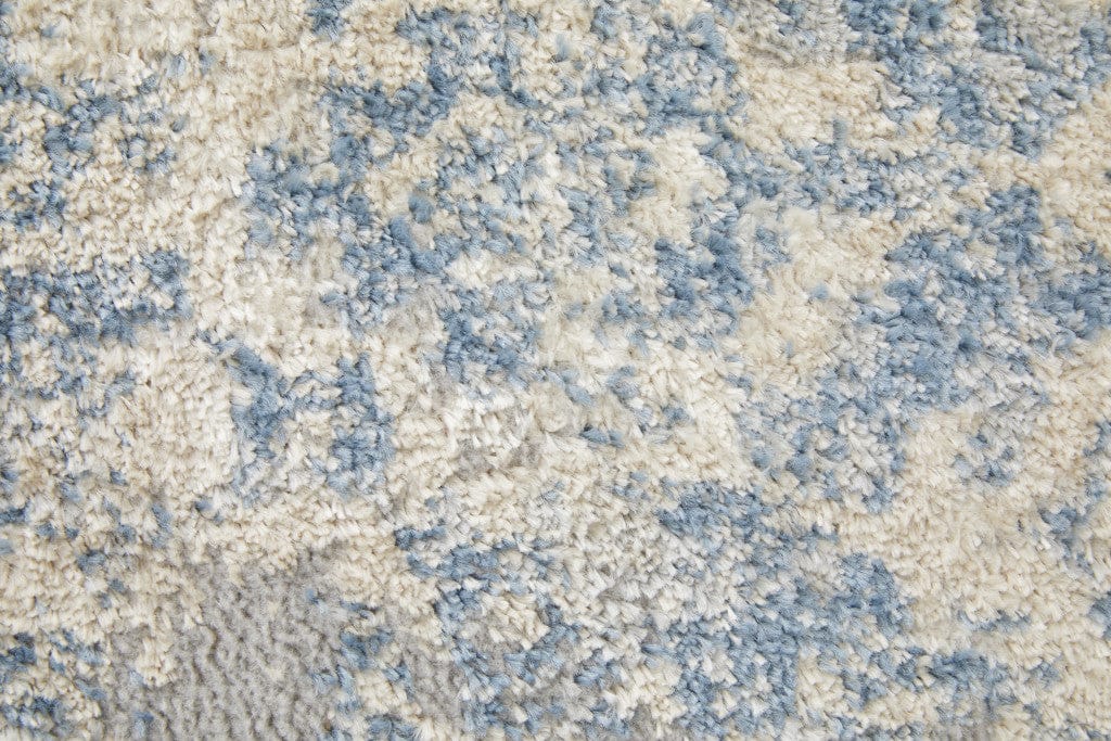 4' X 6' Blue And Ivory Abstract Power Loom Distressed Area Rug