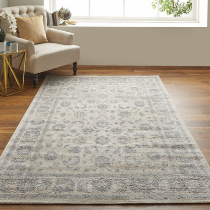 4' X 6' Ivory And Blue Abstract Power Loom Distressed Area Rug