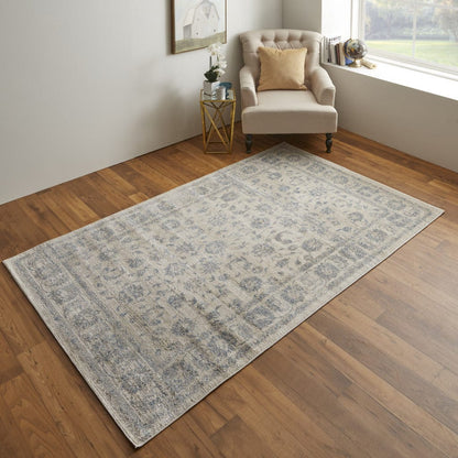 4' X 6' Ivory And Blue Abstract Power Loom Distressed Area Rug