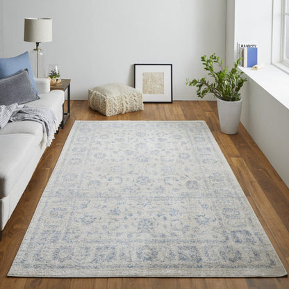 4' X 6' Ivory And Blue Abstract Power Loom Distressed Area Rug