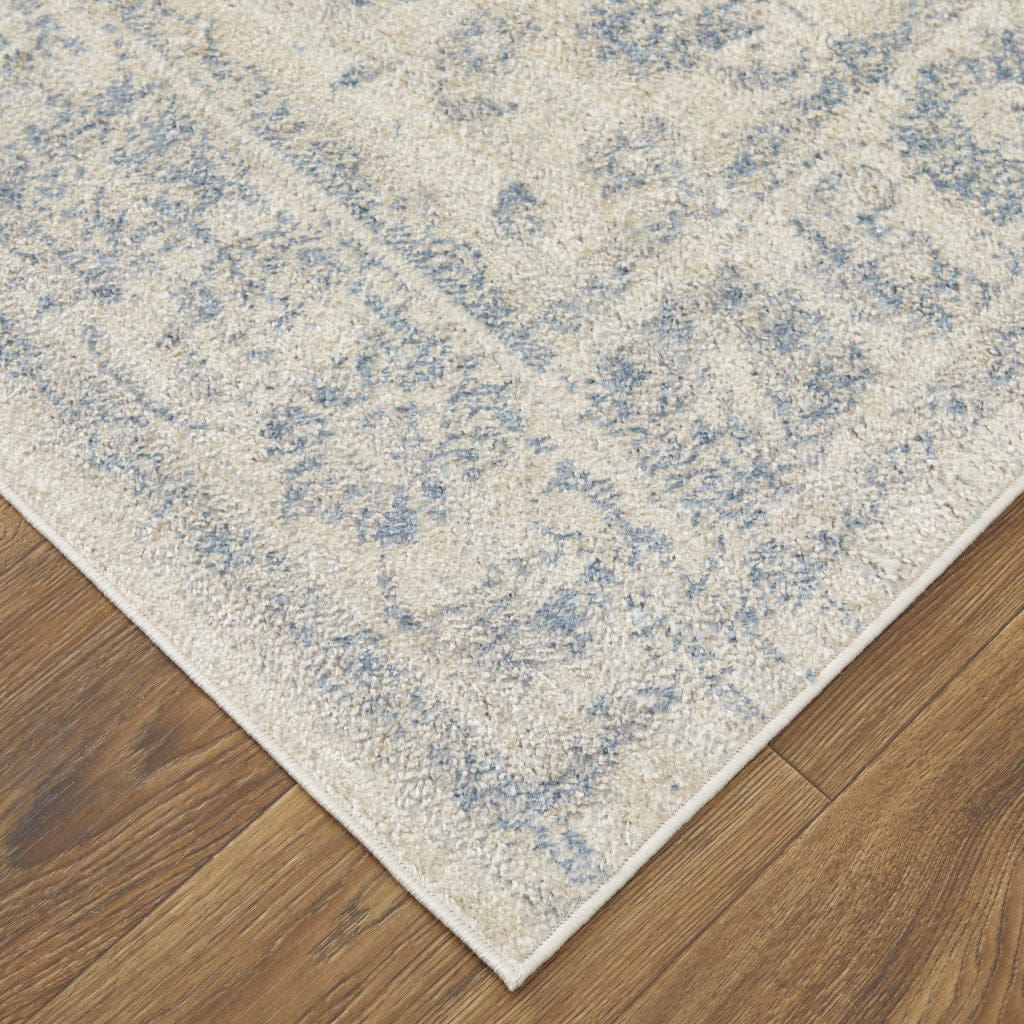 4' X 6' Ivory And Blue Abstract Power Loom Distressed Area Rug