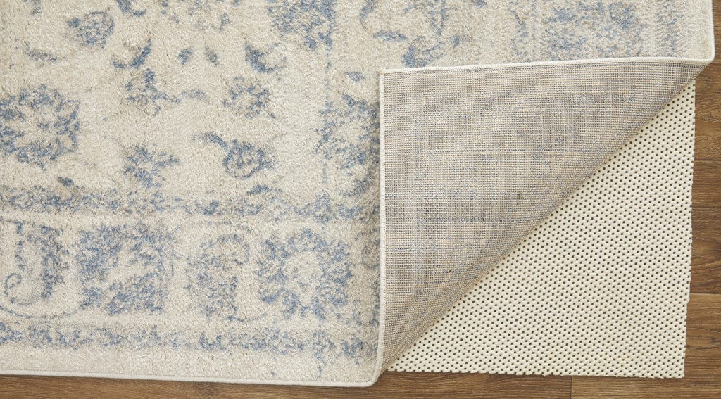 4' X 6' Ivory And Blue Abstract Power Loom Distressed Area Rug