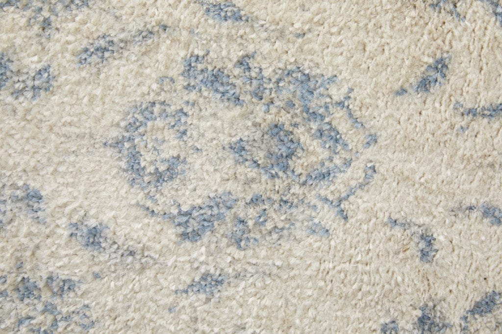 4' X 6' Ivory And Blue Abstract Power Loom Distressed Area Rug