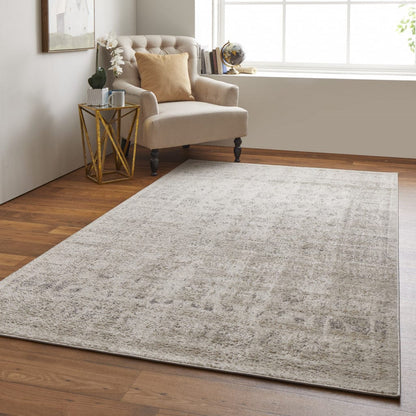 4' X 6' Ivory And Blue Abstract Power Loom Distressed Area Rug
