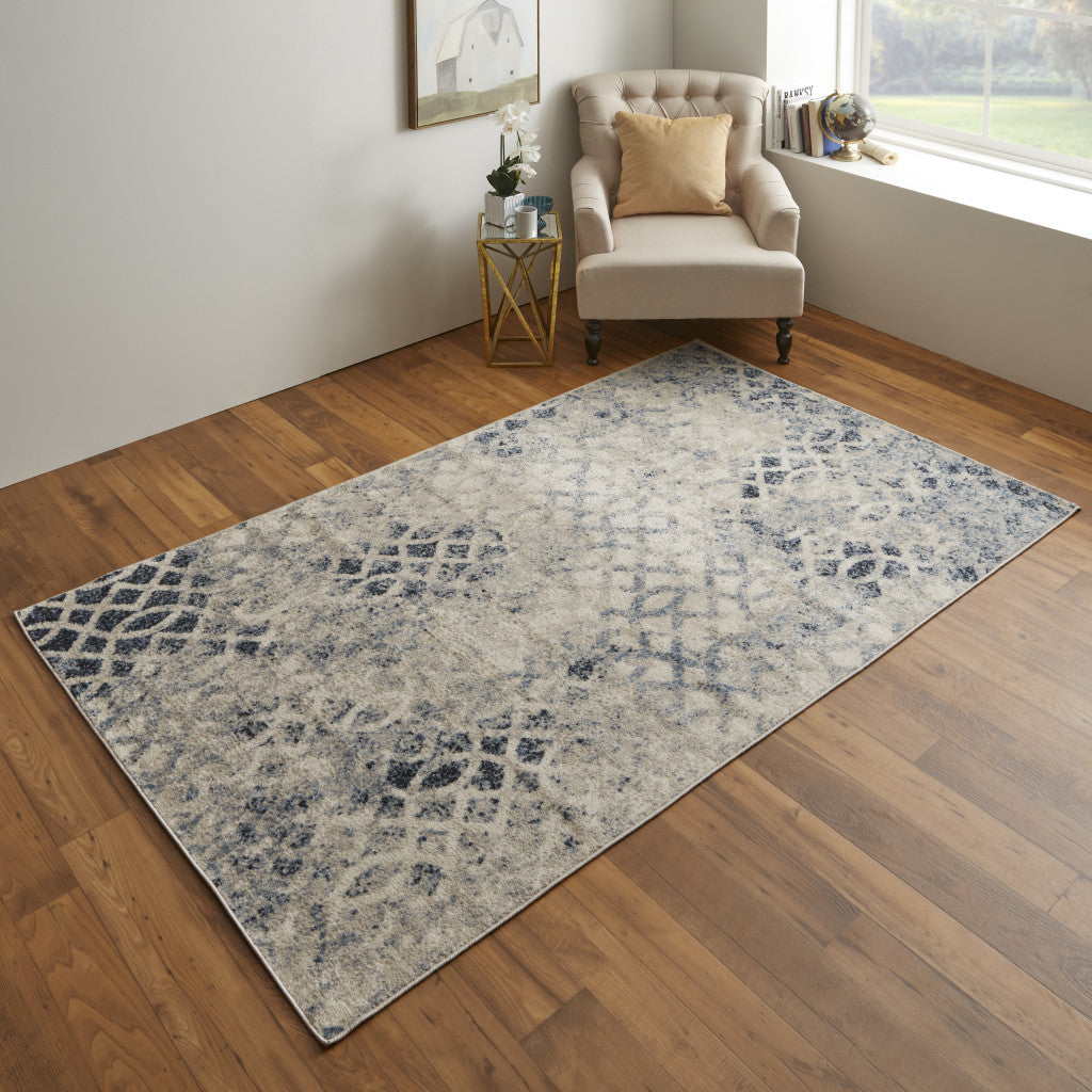 4' X 6' Ivory And Blue Abstract Power Loom Distressed Area Rug