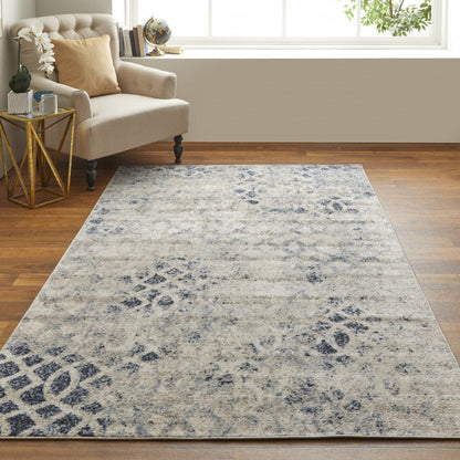 4' X 6' Ivory And Blue Abstract Power Loom Distressed Area Rug