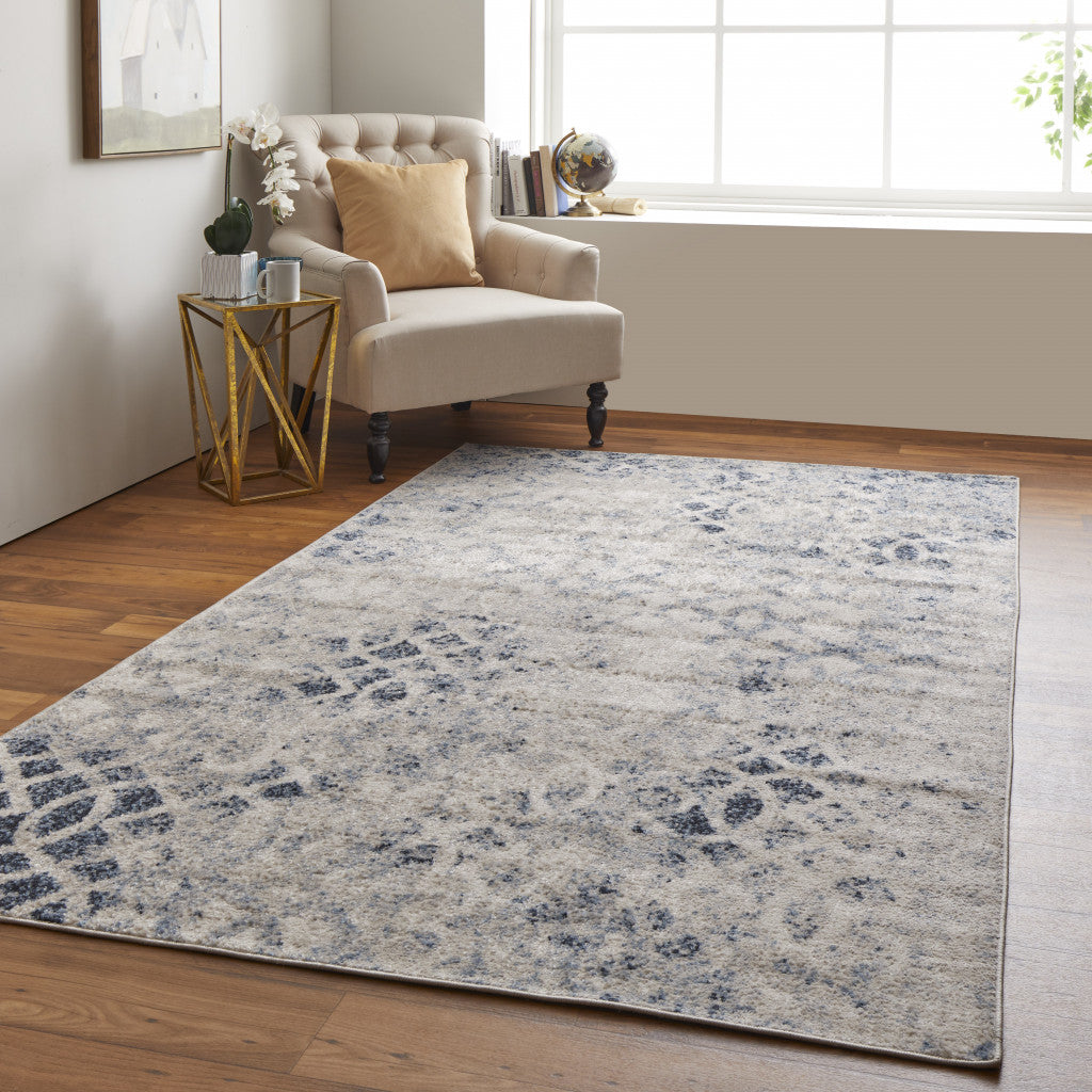 4' X 6' Ivory And Blue Abstract Power Loom Distressed Area Rug