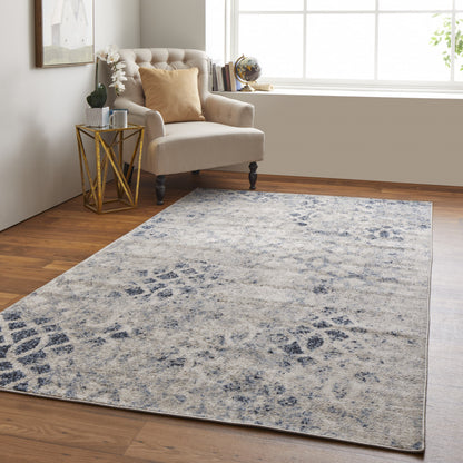 4' X 6' Ivory And Blue Abstract Power Loom Distressed Area Rug