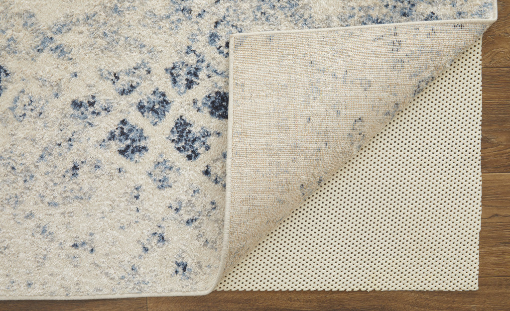 4' X 6' Ivory And Blue Abstract Power Loom Distressed Area Rug