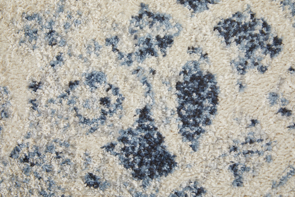 4' X 6' Ivory And Blue Abstract Power Loom Distressed Area Rug