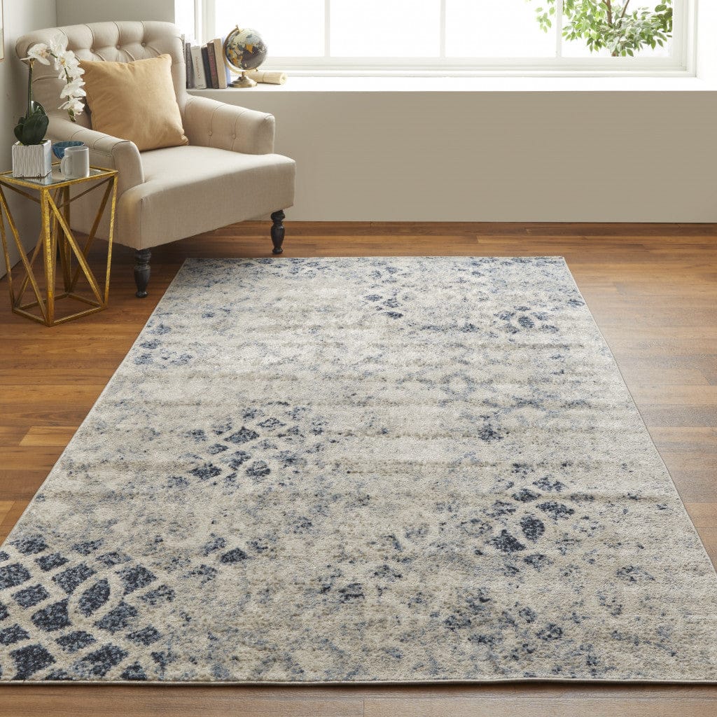 4' X 6' Ivory And Blue Abstract Power Loom Distressed Area Rug