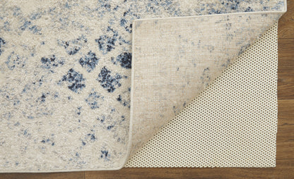 4' X 6' Ivory And Blue Abstract Power Loom Distressed Area Rug