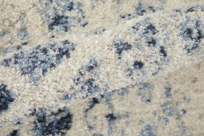 4' X 6' Ivory And Blue Abstract Power Loom Distressed Area Rug