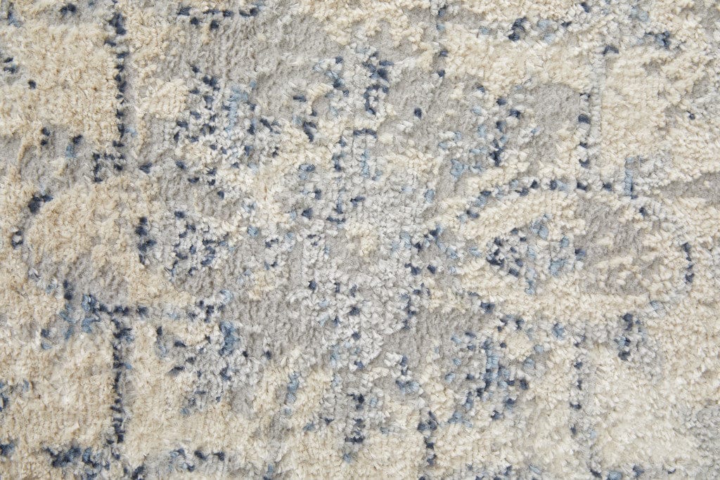 4' X 6' Blue Gray And Ivory Floral Power Loom Distressed Area Rug