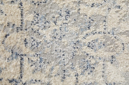 4' X 6' Blue Gray And Ivory Floral Power Loom Distressed Area Rug