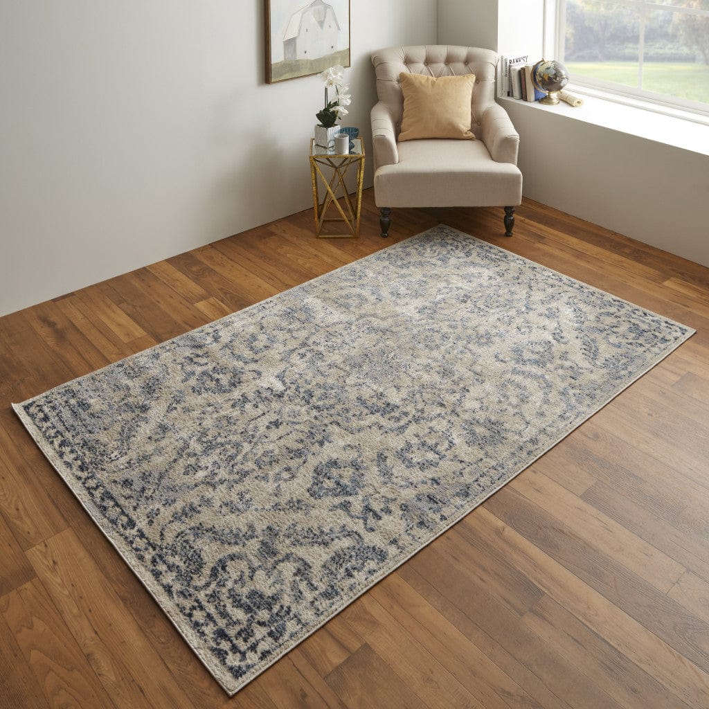 4' X 6' Blue Gray And Ivory Floral Power Loom Distressed Area Rug