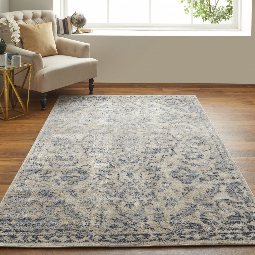 4' X 6' Blue Gray And Ivory Floral Power Loom Distressed Area Rug