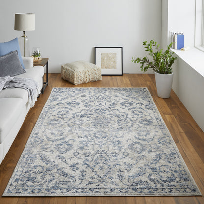 4' X 6' Blue Gray And Ivory Floral Power Loom Distressed Area Rug