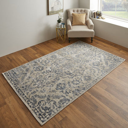 4' X 6' Blue Gray And Ivory Floral Power Loom Distressed Area Rug
