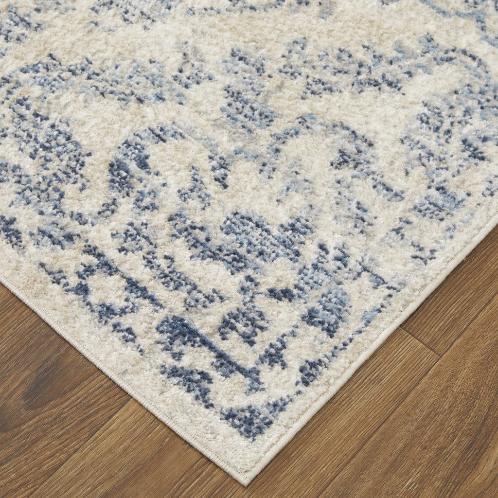 4' X 6' Blue Gray And Ivory Floral Power Loom Distressed Area Rug